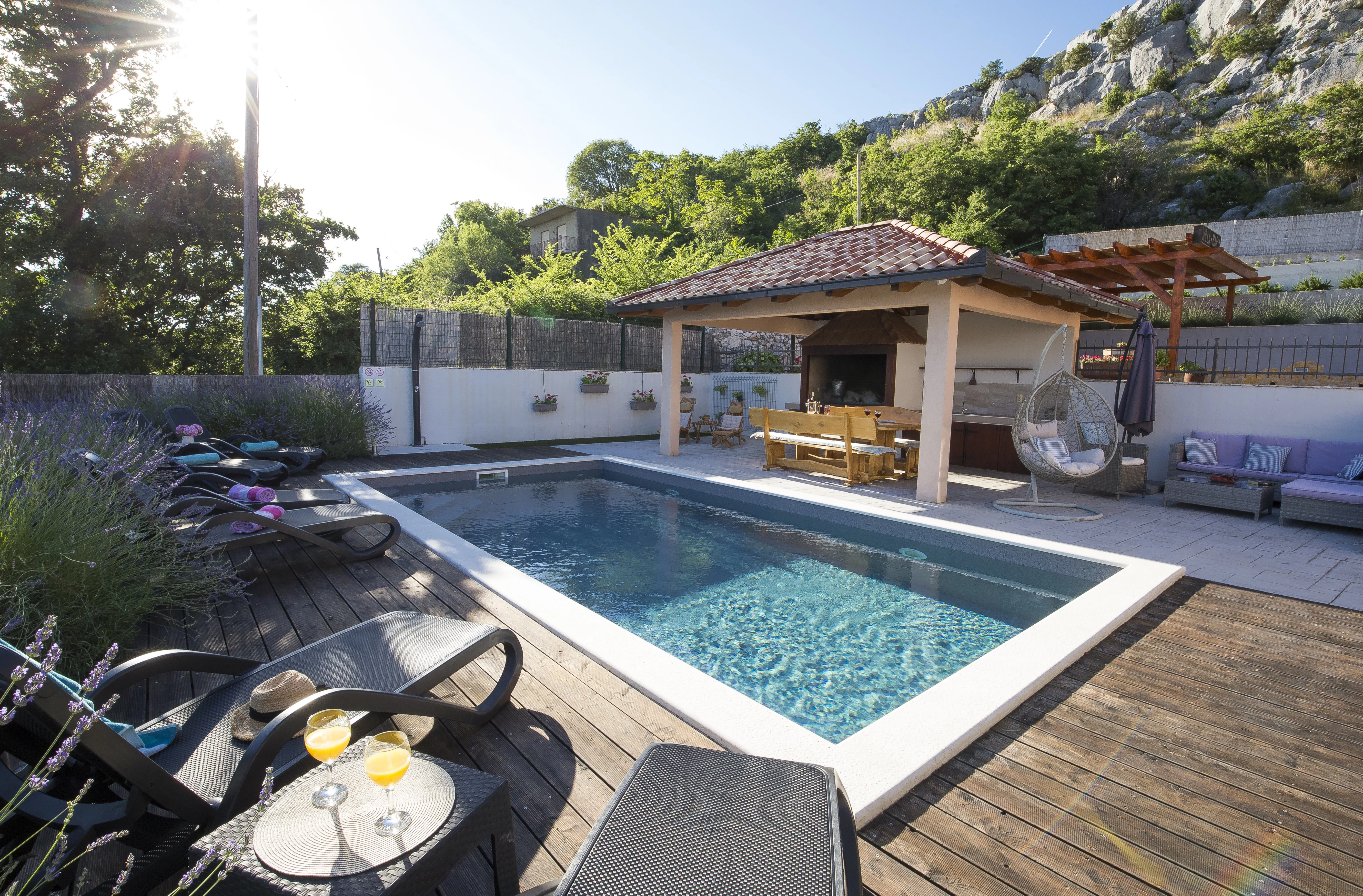 Swimming pool with lounge chairs